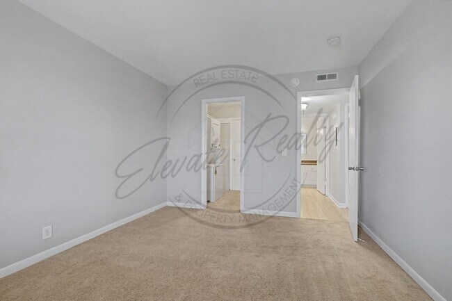 Building Photo - SPRING SPECIAL!! FIRST MONTH FREE on this Two Bedroom Condo, Second Floor, across from Madison Pa...