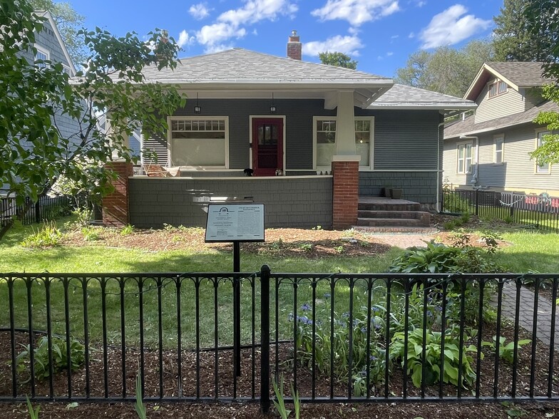 front of home (summer) showing plaque for inclusion on National Register of Historic Places - 508 Daly Ave