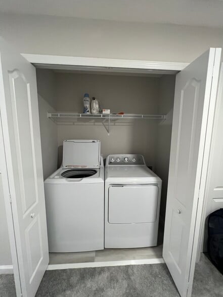 New washer & dryer with shelving - 14799 Outfitter St
