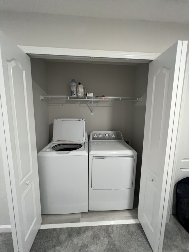 New washer & dryer with shelving - 14799 Outfitter St