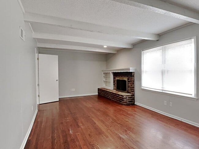 Building Photo - Spacious 4BR Home with Finished Basement, Fireplace & Unique Layout