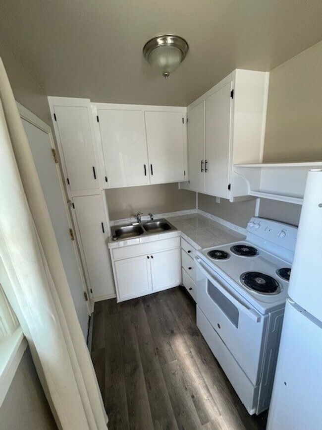 Building Photo - Coming soon! Charming 1-Bedroom Oasis with Modern Upgrades & Spacious Yard!