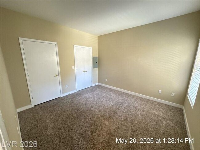 Building Photo - Gated Green Valley Condo with Dual Walk-In Closets & Resort Amenities