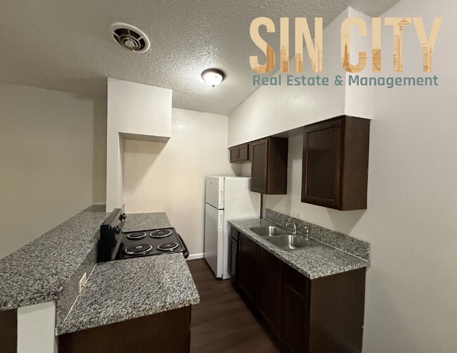 Building Photo - Discover Urban Comfort: Spacious Second Floor 1-Bedroom Oasis at Lyn Capri