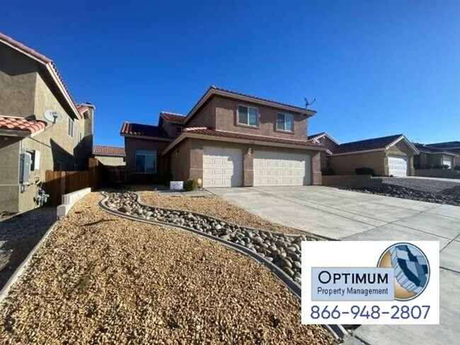 Building Photo - Spacious 4-Bedroom Home with 3-Car Garage & Downstairs Suite!