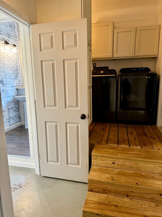 Flex space leads to laundry area which is right off the kitchen - 6111 Northlakes Dr