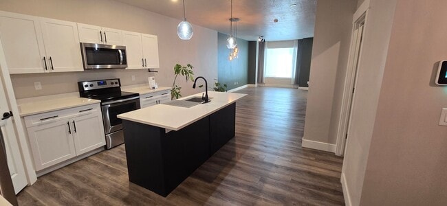 Building Photo - Come check out this beautiful 3 story town...