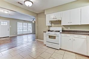 Kitchen is open to the living/dining room for seamless entertaining. - 4609 Nina Lee Ln