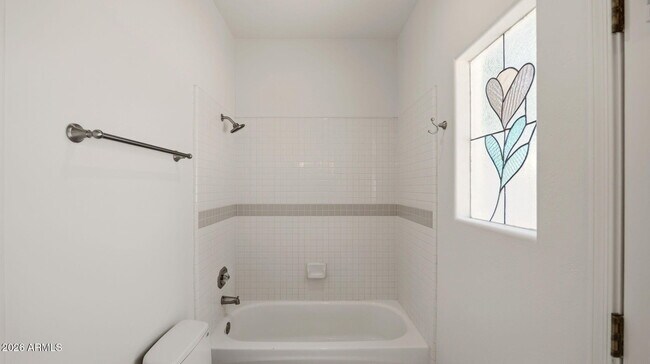 Building Photo - 8638 E Dahlia Dr