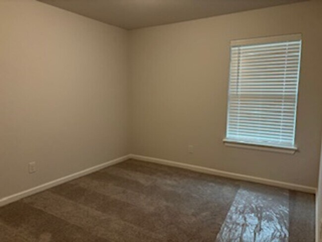 Building Photo - First Month Free - New Home!
