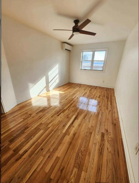 Building Photo - 69-19 43rd Ave