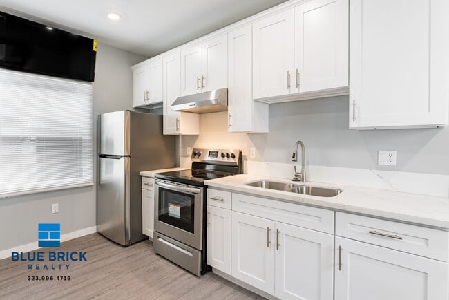 Building Photo - 1166 1/2 W 29th St-1166