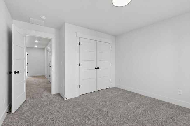 Building Photo - $300 off first month for February move-ins - BRAND NEW 3 BED 2.5 BATH TOWNHOMES WITH 2 CAR GARAGE