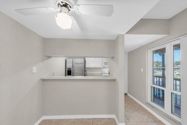 Building Photo - Gated Waterfront Community  1-Bedroom 1.5 ...