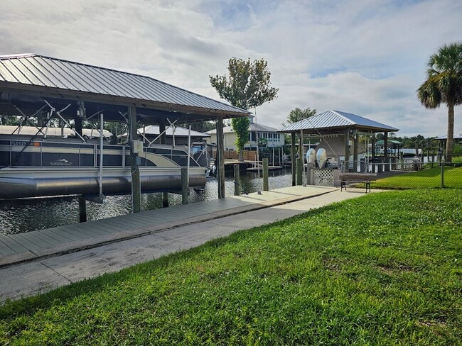 Building Photo - Waterfront 2 Bedroom, 2 Bath Stilt Home with Dock