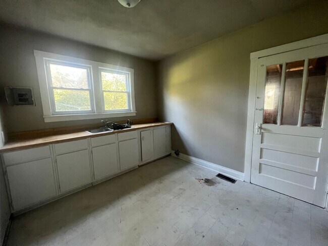 Building Photo - Remodeled 2 bedroom house with large yard.