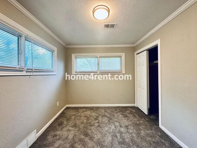 Building Photo - Lovely Three Bedroom Home in KCMO and an Updated Kitchen  w/ Granite and SS Appliances, including...