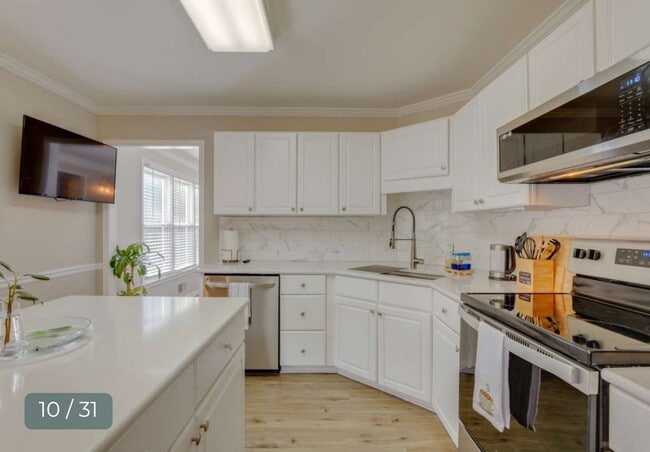 Building Photo - Fully furnished or unfurnished 4-bedroom ranch in Lawrenceville