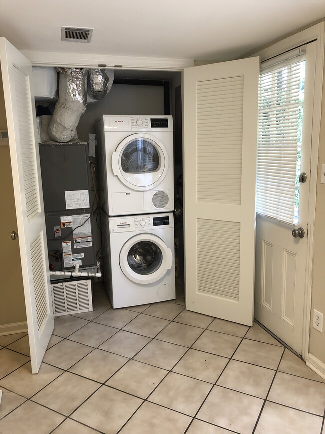 Garden Washer Dryer in sunroom and rear door to courtyard. - 20 E Macon St