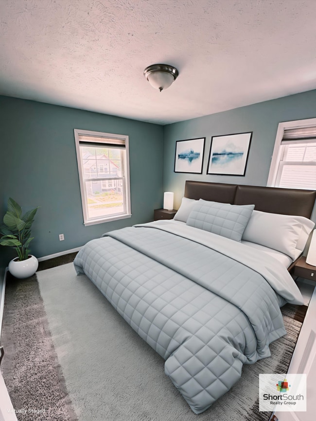 Building Photo - Wealthy St 4 bed 2 bath Single Family Home