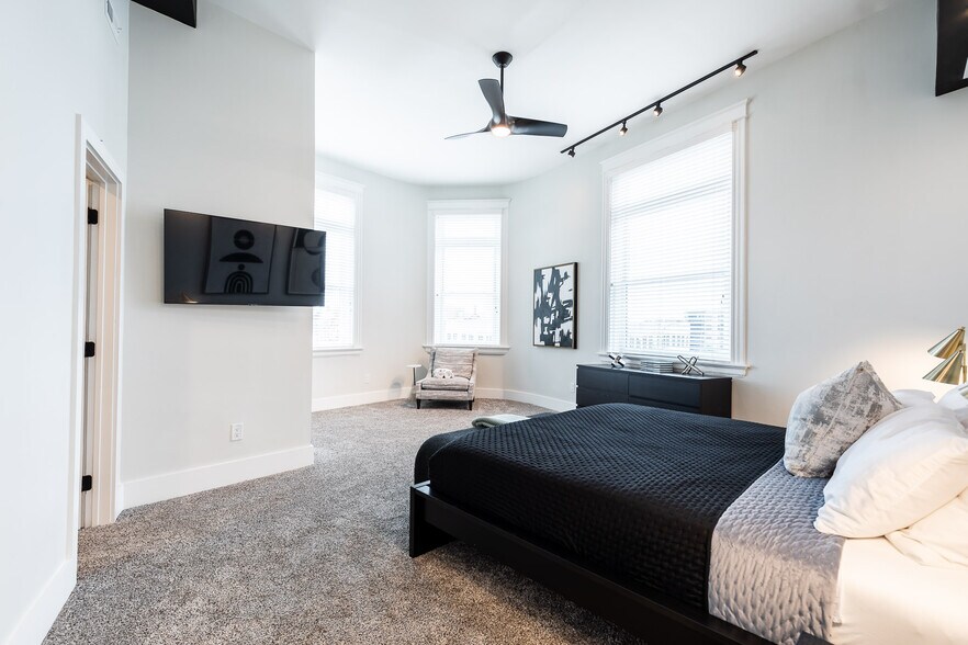 Spacious primary bedroom with sitting area built-in closet and spa like bath. - 795 E McMillan St