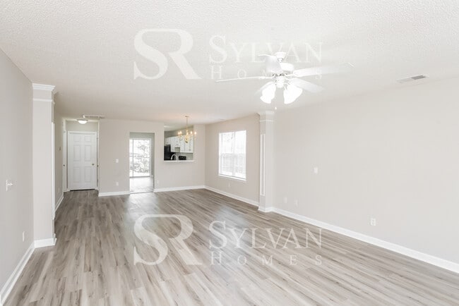 Building Photo - Welcome to this beautiful and sun-filled 3...