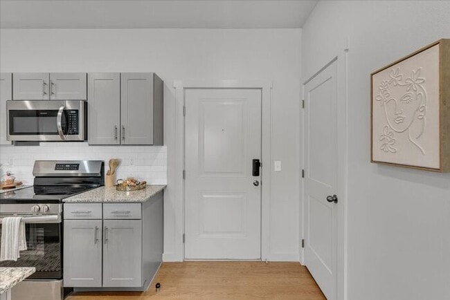 Building Photo - Step Right Up — Move In for Just $99 When You Sign by 8/31! | Brand-New 2-Bed, 2-Bath Apartments ...