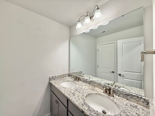 Building Photo - Stunning End Unit 3BD, 2.5BA Wendell Townhome with a 2-Car Garage in a Gorgeous HOA Community wit...