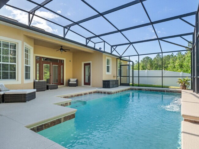 Building Photo - Spacious 4-Bedroom Pool Home with 3 Full B...