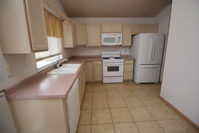 Building Photo - Spacious Home with Finished Basement and Fenced Backyard in 80923