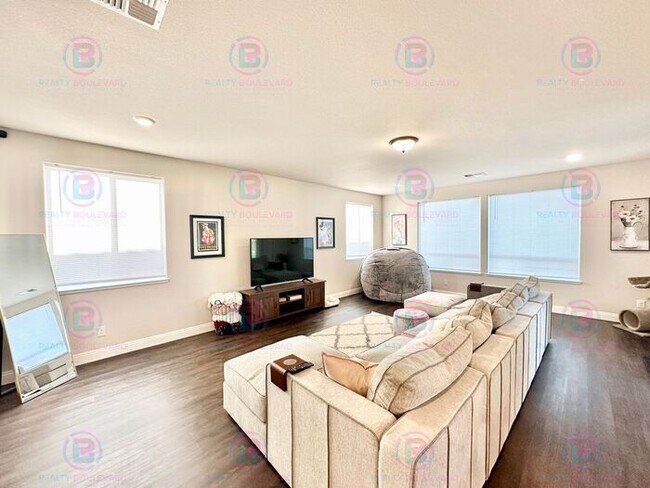 Building Photo - Welcome to your dream home, where modern elegance meets unparalleled convenience!