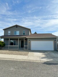 Building Photo - 4 Bedroom 3 Bathroom Home with Attached Ga...