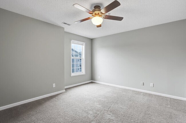 Building Photo - Freshley Painted! Updated Flooring! Centra...