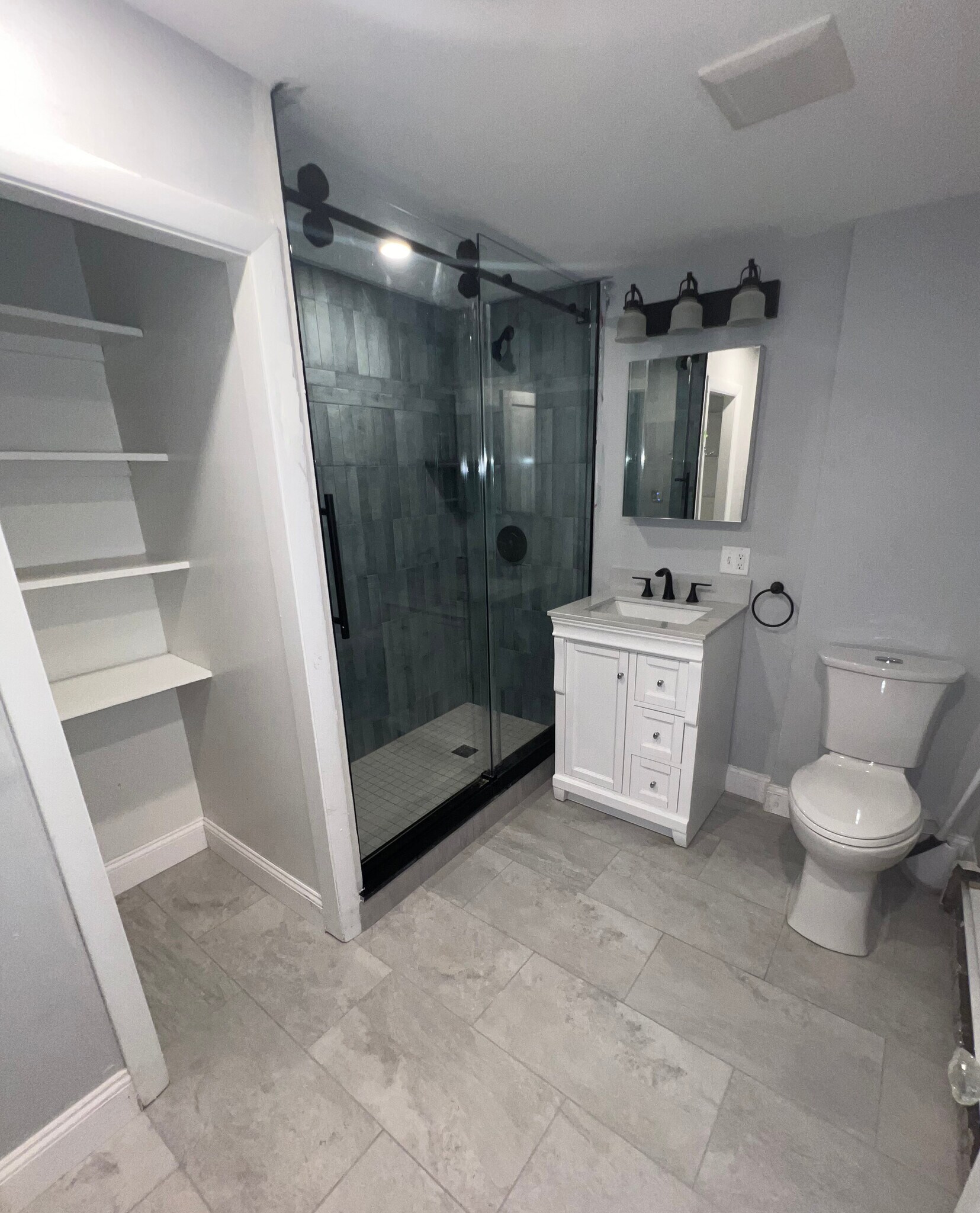 Laundry closet in full bath - 347 Elliot St