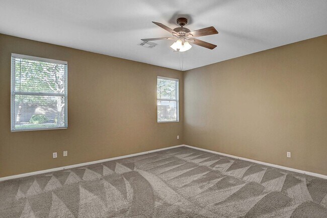 Building Photo - Gorgeous NW Single Story! 3 Car Garage! Serene Backyard.