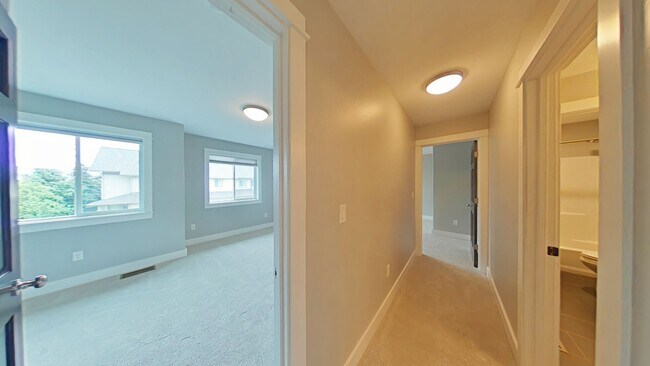 Building Photo - Stunning 3-bedroom, 2.5-bathroom condo with attached 2 stall garage!