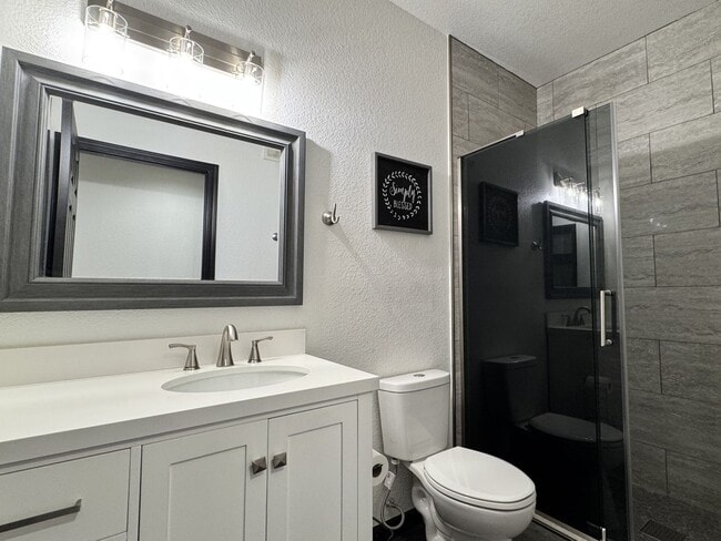 Building Photo - Modern Remodeled Condo with 3 Ensuite Bedr...