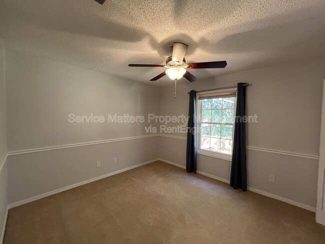 Building Photo - 6004 Players Pl