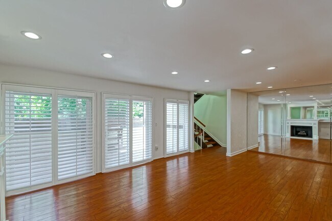 Building Photo - BRIGHT & AIRY, REAR-UNIT TOWNHOUSE W/ SPACIOUS PATIO, BALCONY & HUGE 2-CAR GARAGE IN GATED COMMUN...