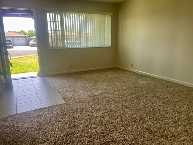 Building Photo - Charming house in an established quiet neighborhood in a court