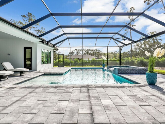 Building Photo - Brand-new contemporary estate on 2.27 private acres