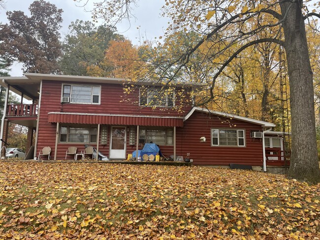 Building Photo - Log Cabin (Triplex)