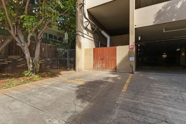 Building Photo - Wake Up to Stunning Mountain & Ala Wai Canal Views in the Heart of Waikiki