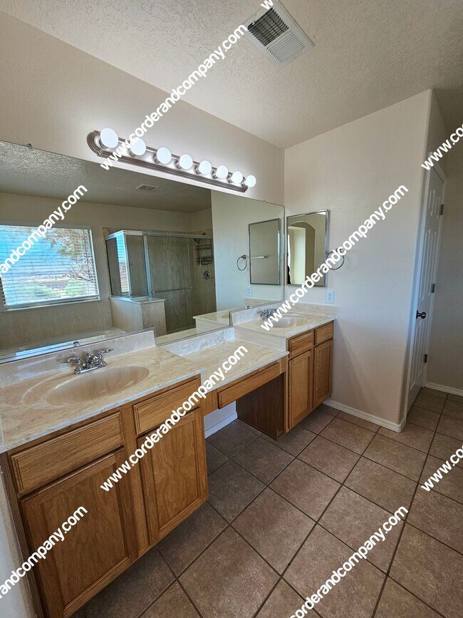 Building Photo - Custom 3 Bedroom, 2 Bathrooms, 2 Car Garage and 2,212 Sq Ft. Home with Beautiful Sandia Mountain ...