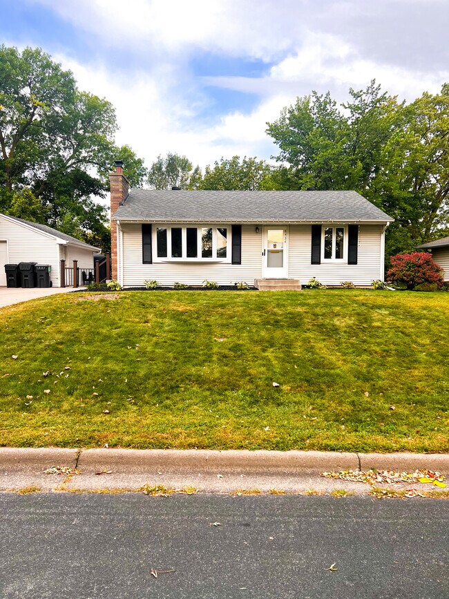 House Front View (new landscaping & storm shutters) - 8434 Colfax Ave S
