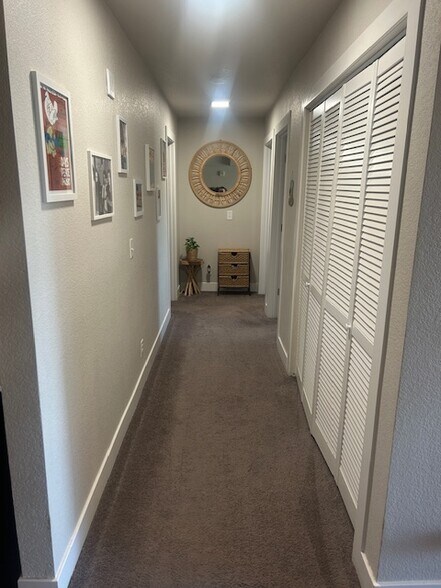 hallway to bedrooms - 1401 W 85th Ave
