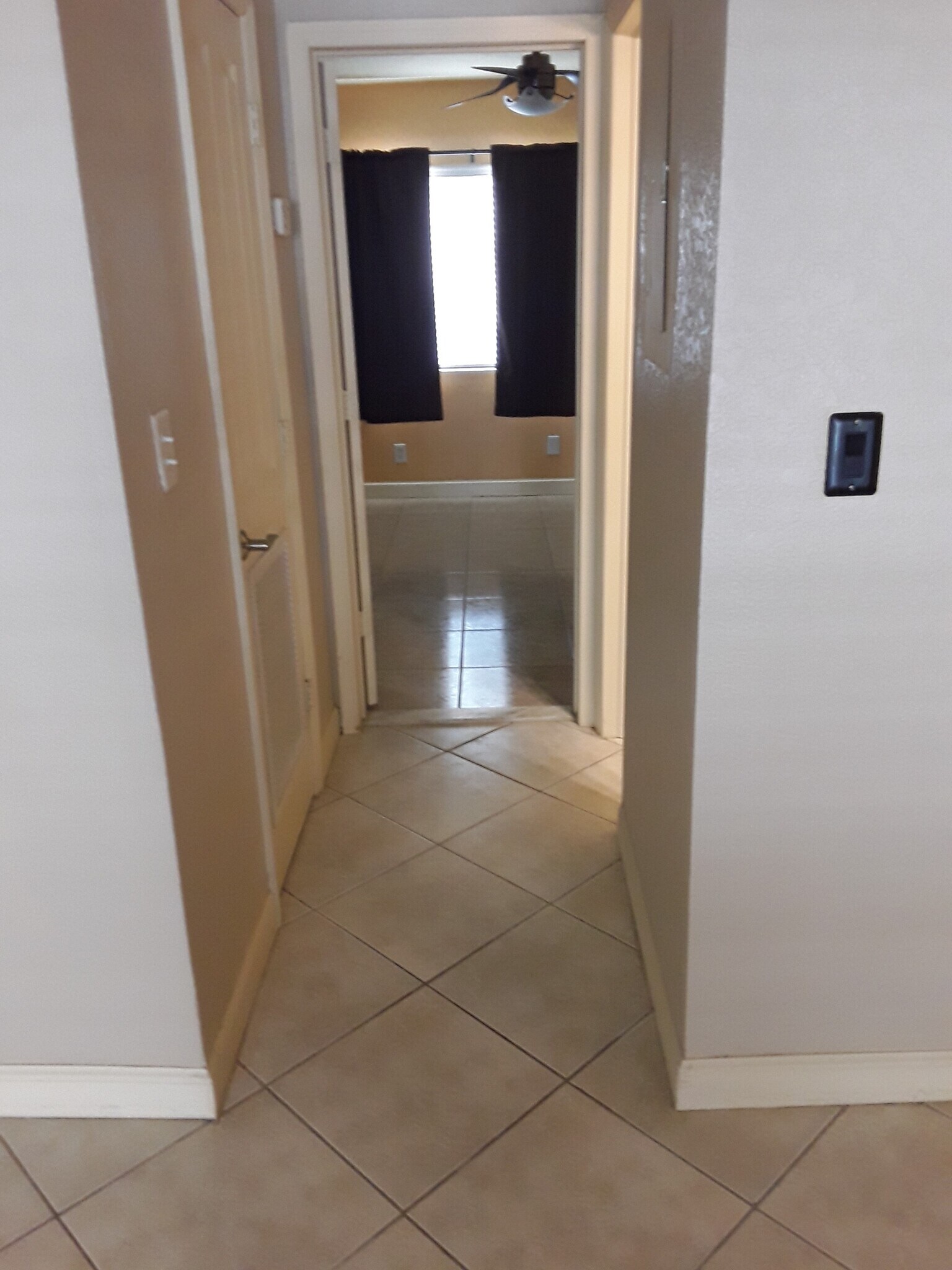 To Bedroom +Bath + Utility Room on Left - 2881 NE 32nd St