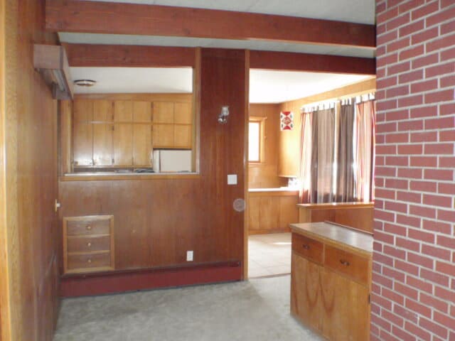 Looking into kitchen from living room upper level - 1815 E Park Ave
