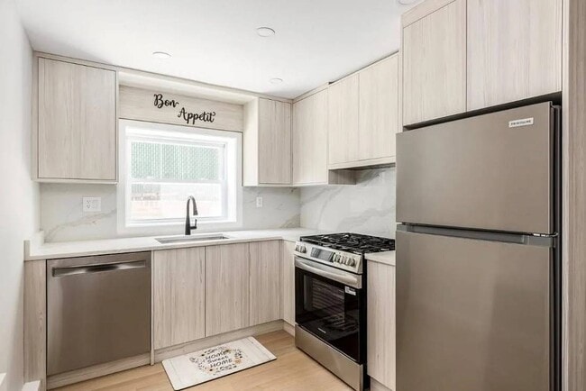 Building Photo - 208-12 53rd Ave