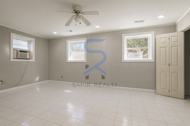 Building Photo - Move in before November 30th and choose your reward: a $250 Amazon Gift Card or a 55" Smart TV!